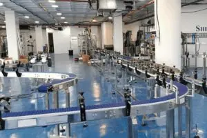 On Site & Remote Support Technician supporting conveyor and feeding equipment in a packaging plant